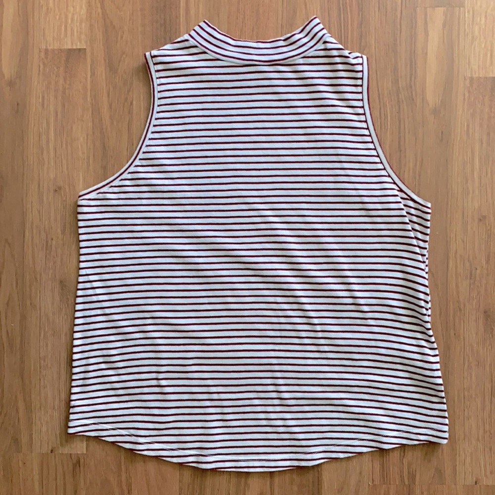 Burgundy and white strip women’s size medium mock sleeveless top.